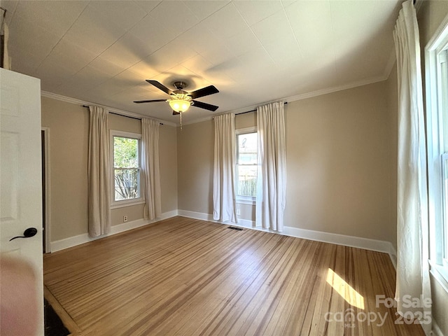 339 Mayflower Ave, Cramerton, NC 28032 - spare room with light wood-type flooring, ceiling fan, and ornamental molding