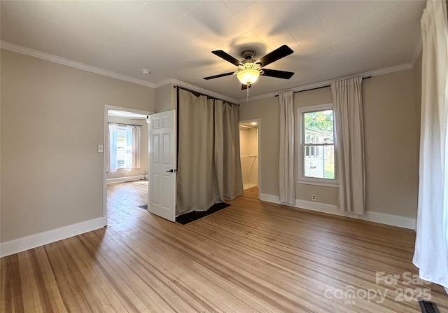 339 Mayflower Ave, Cramerton, NC 28032 - unfurnished room featuring light wood-style flooring, ceiling fan, and ornamental molding