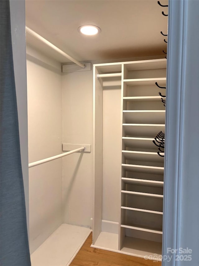 339 Mayflower Ave, Cramerton, NC 28032 - walk in closet with wood finished floors
