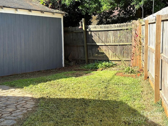 339 Mayflower Ave, Cramerton, NC 28032 - fenced backyard featuring an outdoor structure