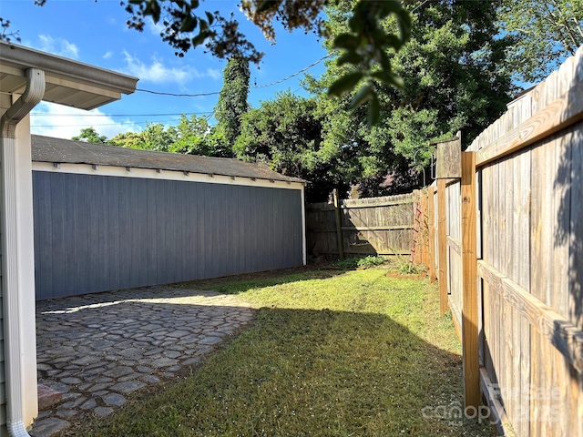 339 Mayflower Ave, Cramerton, NC 28032 - fenced backyard with a patio