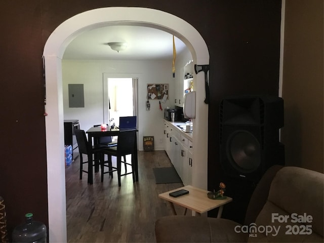 448 Belk St, Lancaster, SC 29720 - living room with arched walkways, dark wood-style flooring, and electric panel
