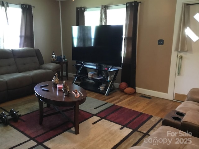 448 Belk St, Lancaster, SC 29720 - living room featuring wood finished floors and baseboards