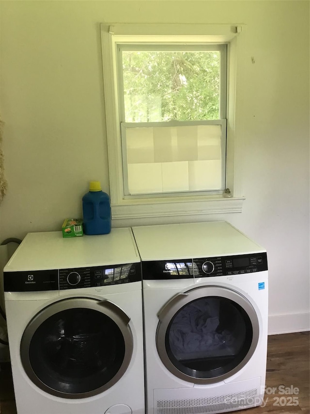 448 Belk St, Lancaster, SC 29720 - washroom featuring washing machine and dryer and wood finished floors