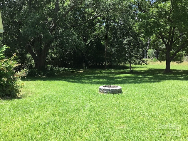 448 Belk St, Lancaster, SC 29720 - view of green lawn with a fire pit