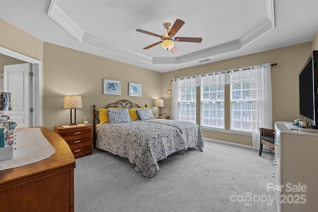 5238 Prosperity View Dr, Charlotte, NC 28269 - bedroom with a tray ceiling, carpet, a ceiling fan, and crown molding