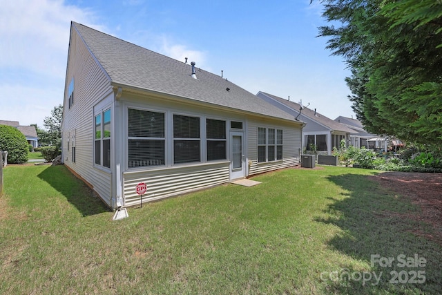 5238 Prosperity View Dr, Charlotte, NC 28269 - rear view of property featuring a lawn and roof with shingles
