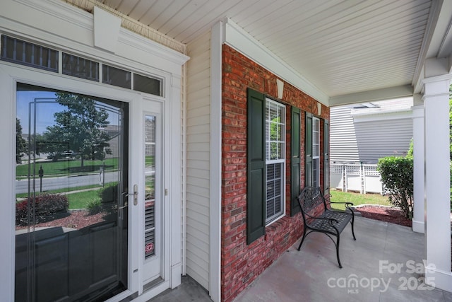 5238 Prosperity View Dr, Charlotte, NC 28269 - view of exterior entry featuring covered porch and brick siding