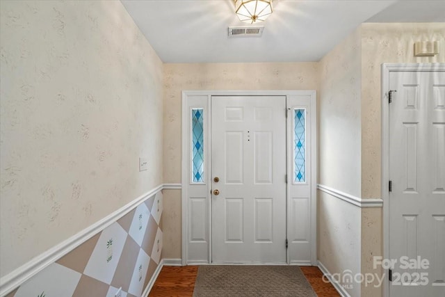 3114 Pine Pointe St, Matthews, NC 28104 - foyer with wallpapered walls and dark wood finished floors