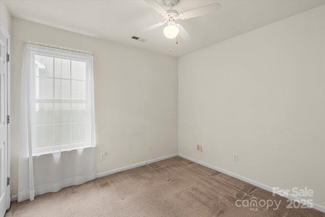 3114 Pine Pointe St, Matthews, NC 28104 - spare room featuring light carpet and a ceiling fan