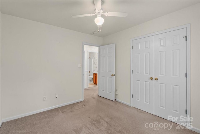 3114 Pine Pointe St, Matthews, NC 28104 - unfurnished bedroom with light carpet, a closet, and a ceiling fan