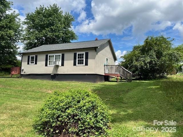 1545 Fairway Acres Dr, Lenoir, NC 28645 - view of property exterior with a lawn and a wooden deck