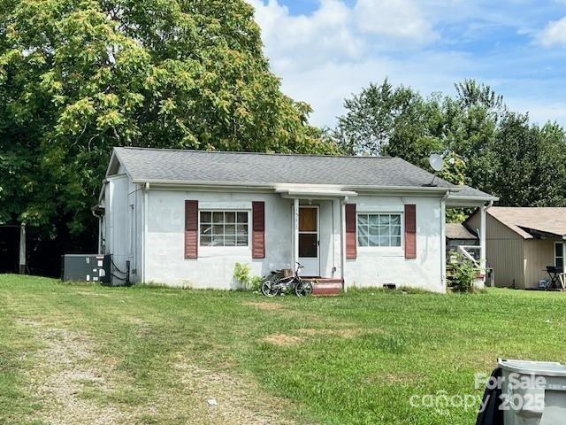 1545 Fairway Acres Dr, Lenoir, NC 28645 - single story home with a front lawn and stucco siding