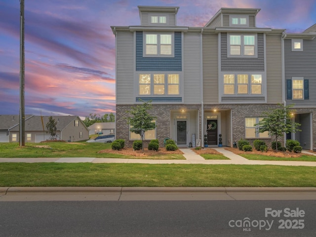 8332 Waxhaw Hwy, Waxhaw, NC 28173 - multi unit property featuring a front yard and brick siding