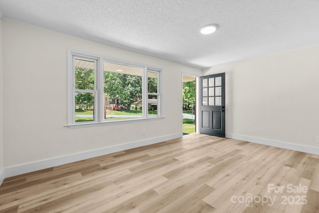 306 2nd Avenue Pl NE, Conover, NC 28613 - entryway featuring a textured ceiling and wood finished floors