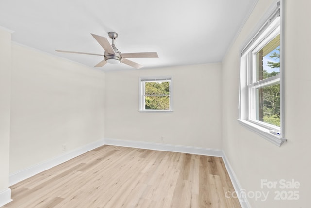 306 2nd Avenue Pl NE, Conover, NC 28613 - spare room with light wood-style floors and ceiling fan