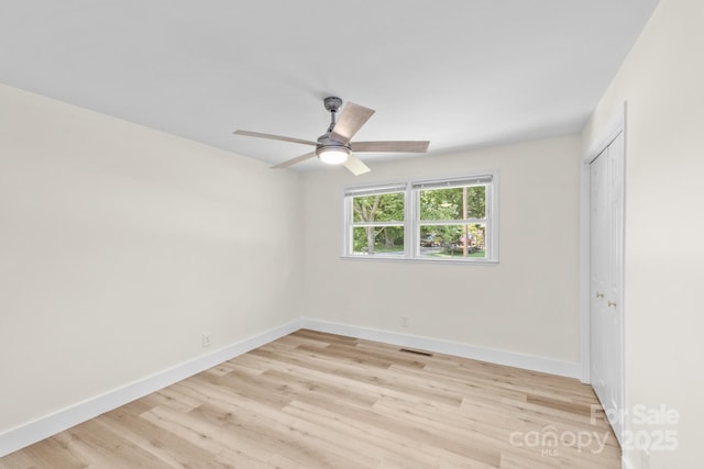 306 2nd Avenue Pl NE, Conover, NC 28613 - unfurnished bedroom featuring light wood-style flooring, a closet, and ceiling fan