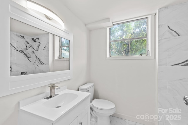 306 2nd Avenue Pl NE, Conover, NC 28613 - bathroom with marble look tile flooring, vanity, and a shower