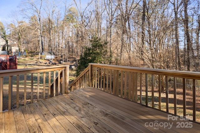 1013 Ashwood Pl, Salisbury, NC 28146 - wooden terrace with view of scattered trees