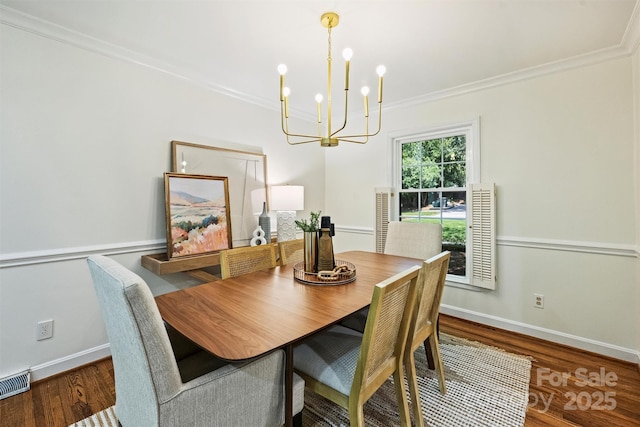6150 Rocky Falls Rd, Charlotte, NC 28211 - dining space featuring a chandelier, crown molding, and wood finished floors