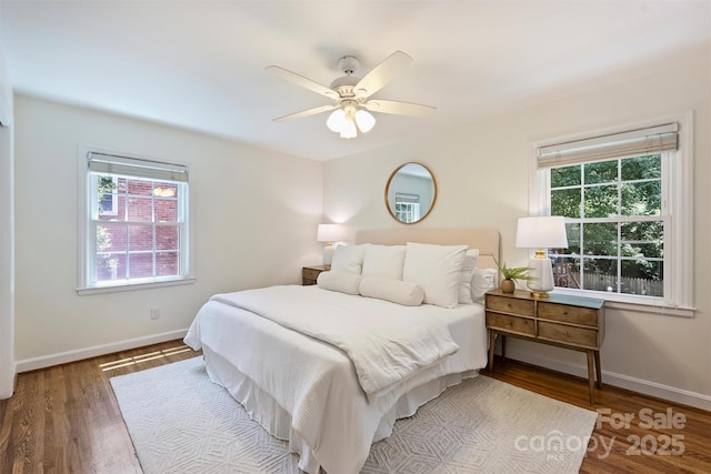 6150 Rocky Falls Rd, Charlotte, NC 28211 - bedroom with multiple windows, wood finished floors, and ceiling fan