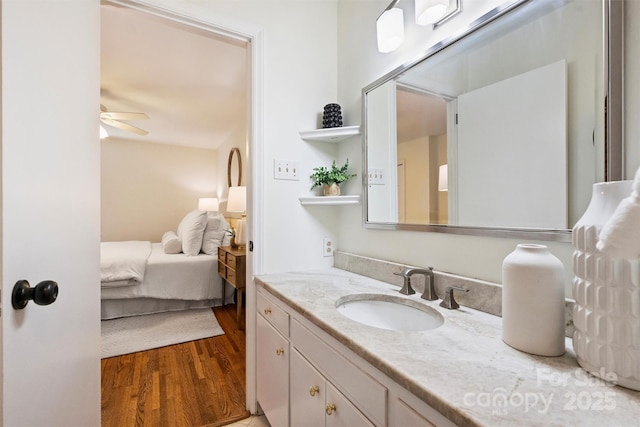 6150 Rocky Falls Rd, Charlotte, NC 28211 - ensuite bathroom featuring vanity, wood finished floors, and a ceiling fan