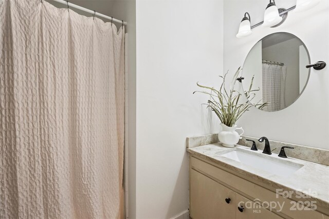 6150 Rocky Falls Rd, Charlotte, NC 28211 - bathroom featuring vanity and a shower with shower curtain