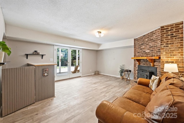 6150 Rocky Falls Rd, Charlotte, NC 28211 - living area featuring wood finished floors and a textured ceiling