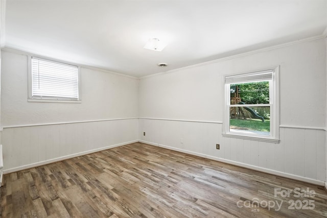 6150 Rocky Falls Rd, Charlotte, NC 28211 - empty room featuring wood finished floors and ornamental molding