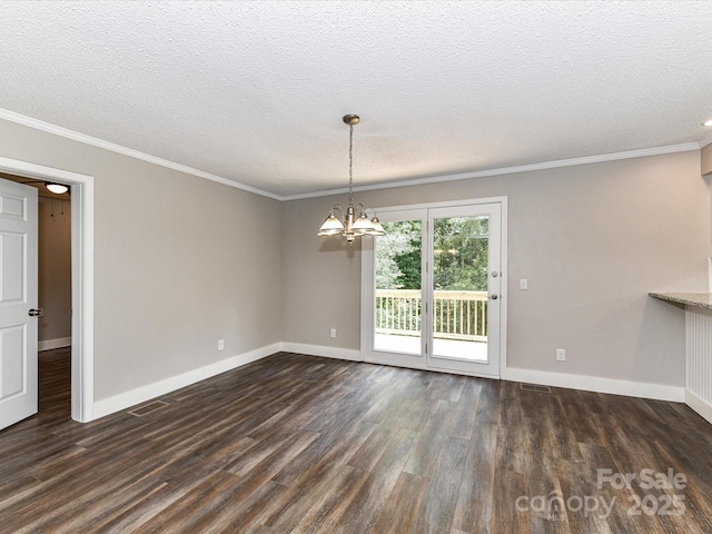 1117 Hidden Brook Ln, Clover, SC 29710 - empty room featuring dark wood finished floors, ornamental molding, a chandelier, and a textured ceiling