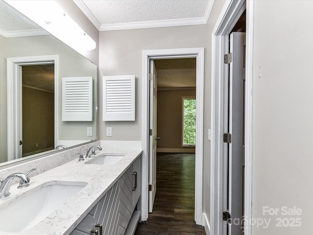 1117 Hidden Brook Ln, Clover, SC 29710 - full bathroom featuring a textured ceiling, wood finished floors, double vanity, and ornamental molding
