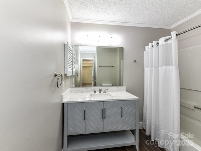 1117 Hidden Brook Ln, Clover, SC 29710 - bathroom with crown molding, a textured ceiling, vanity, wood finished floors, and shower / bath combo