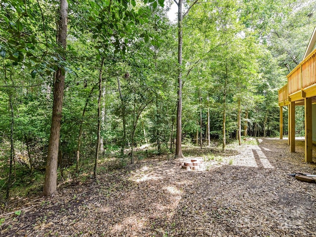 1117 Hidden Brook Ln, Clover, SC 29710 - view of yard with a wooded view and a wooden deck