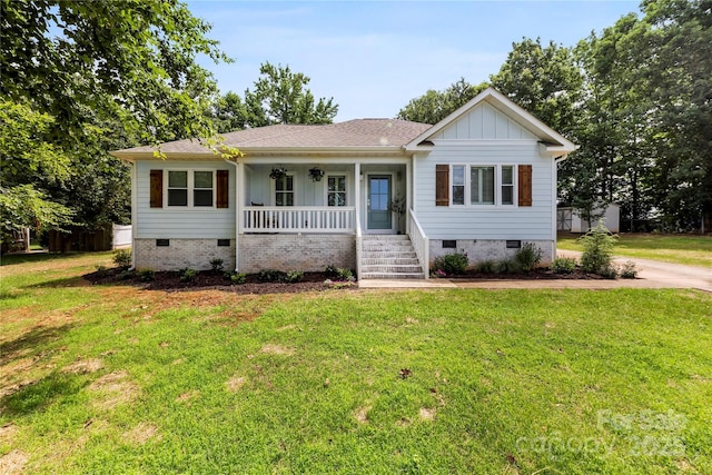 8438 Henry Harris Rd, Fort Mill, SC 29707 - ranch-style home featuring crawl space, a porch, board and batten siding, and a front yard