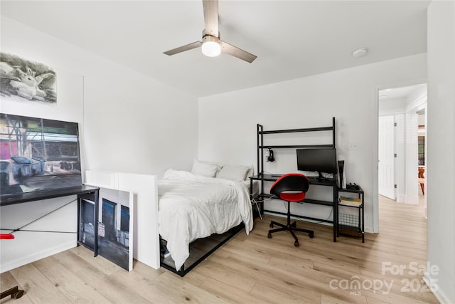 8438 Henry Harris Rd, Fort Mill, SC 29707 - bedroom with wood finished floors and a ceiling fan