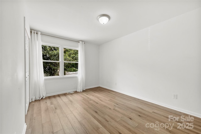 8438 Henry Harris Rd, Fort Mill, SC 29707 - unfurnished room featuring light wood finished floors and baseboards