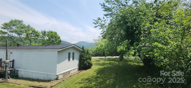 67 Brown Lynch Rd, Candler, NC 28715 - view of side of property with a lawn