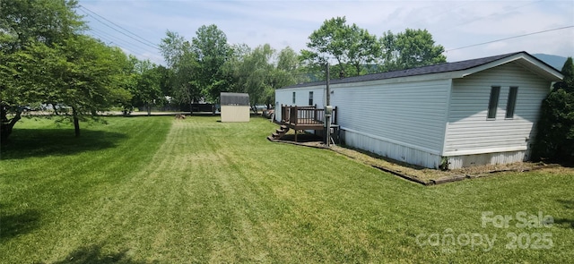 67 Brown Lynch Rd, Candler, NC 28715 - view of green lawn featuring an outbuilding