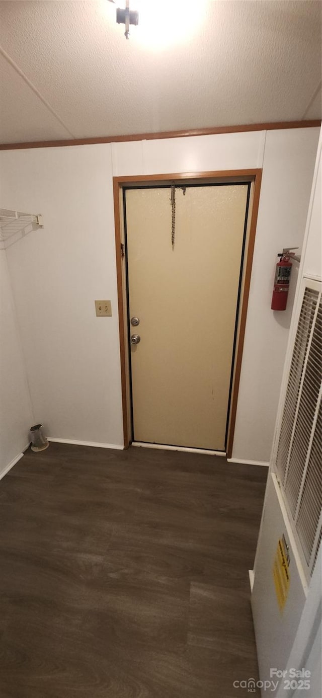 67 Brown Lynch Rd, Candler, NC 28715 - laundry area with dark wood finished floors