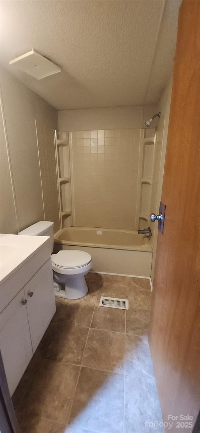 67 Brown Lynch Rd, Candler, NC 28715 - bathroom featuring vanity, a textured ceiling,  shower combination, and tile patterned flooring