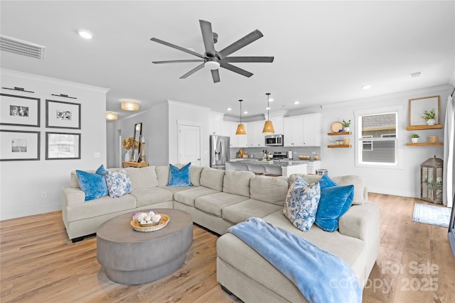 3610 Whitney Way Unit 2, Terrell, NC 28682 - living area featuring crown molding, a ceiling fan, recessed lighting, and light wood-style floors