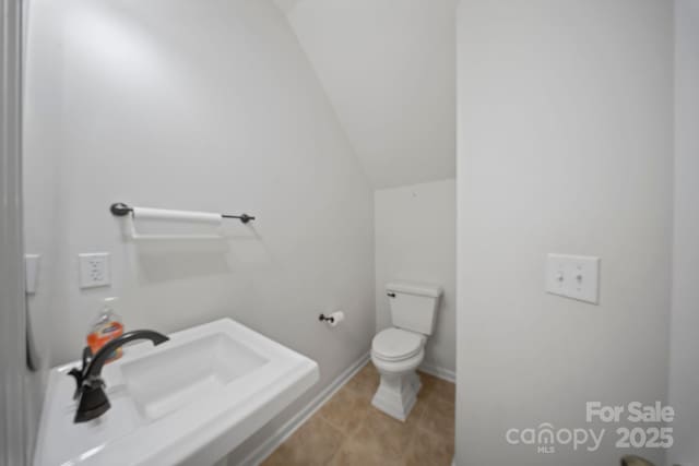 14664 Lions Paw St, Charlotte, NC 28273 - half bath with toilet and vaulted ceiling