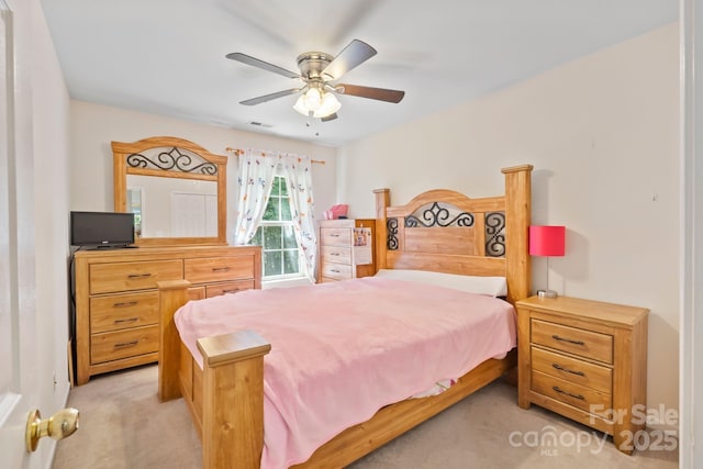 14664 Lions Paw St, Charlotte, NC 28273 - bedroom featuring light colored carpet and ceiling fan