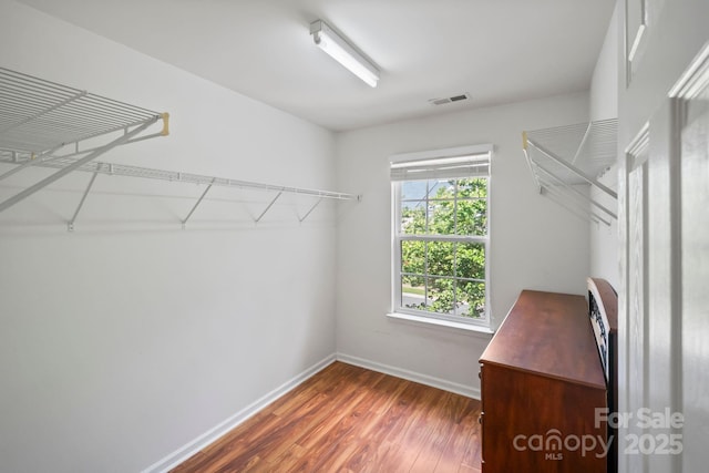 14664 Lions Paw St, Charlotte, NC 28273 - spacious closet featuring wood finished floors