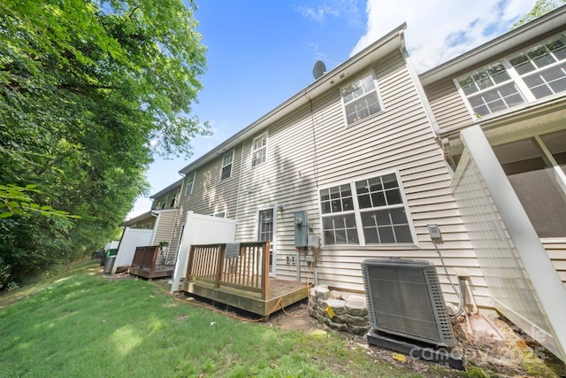 14664 Lions Paw St, Charlotte, NC 28273 - back of property with a wooden deck and a lawn