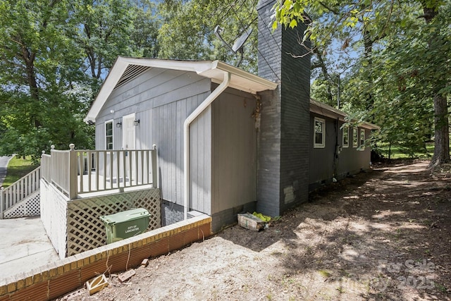 613 Davis St, Lancaster, SC 29720 - view of property exterior with a chimney