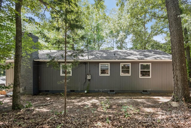 613 Davis St, Lancaster, SC 29720 - back of house with crawl space and a chimney