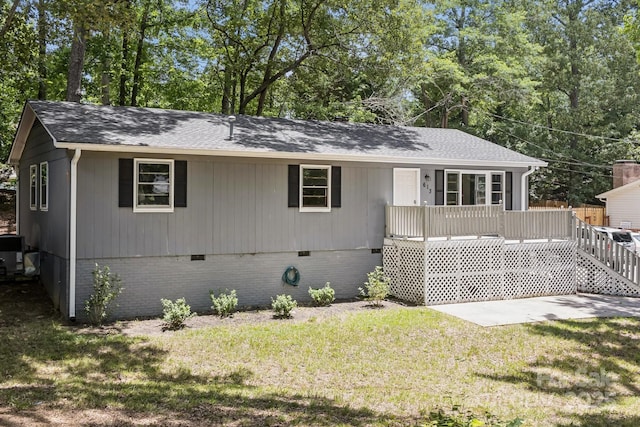 613 Davis St, Lancaster, SC 29720 - view of front of property featuring crawl space, a front lawn, a deck, and roof with shingles