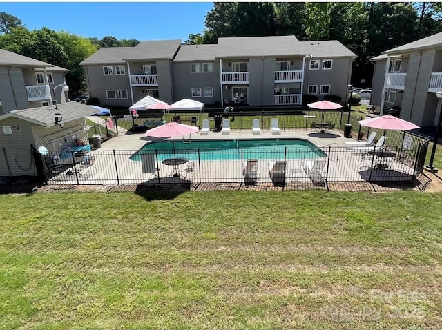 140 Lake Concord Rd NE, Concord, NC 28025 - community pool featuring a patio area