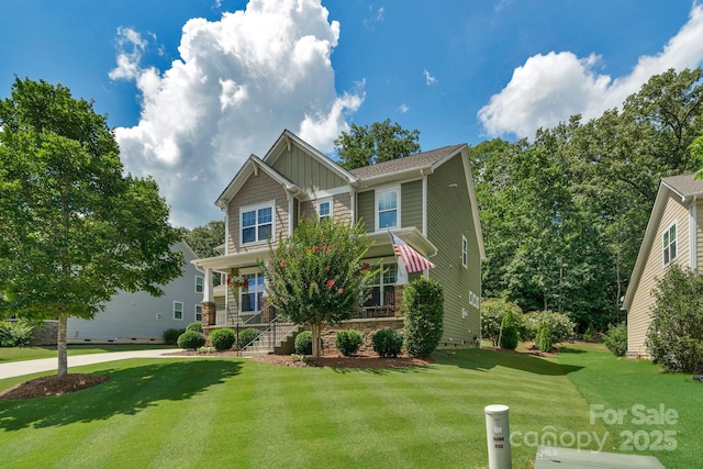 3701 Methodist Church Ln, Waxhaw, NC 28173 - craftsman house featuring board and batten siding, a front lawn, and a porch